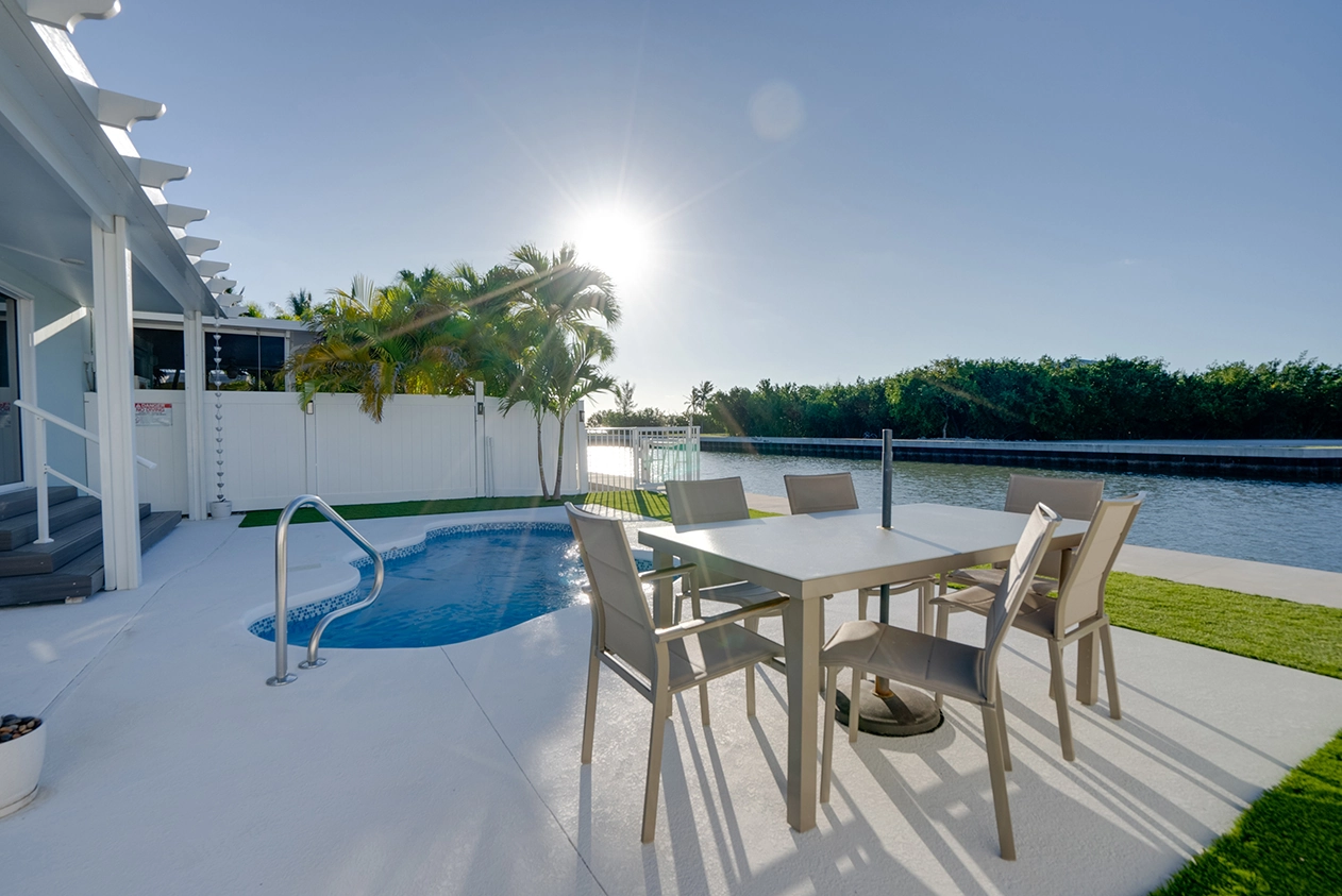 Waterfront pool patio at sunrise, KMS real estate listing photography