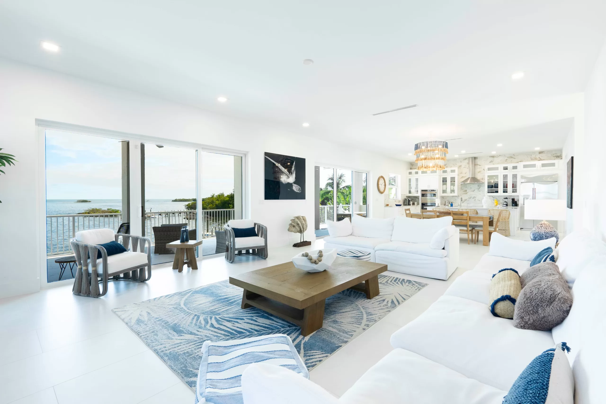 Open-concept living room and kitchen, KMS real estate listing photography